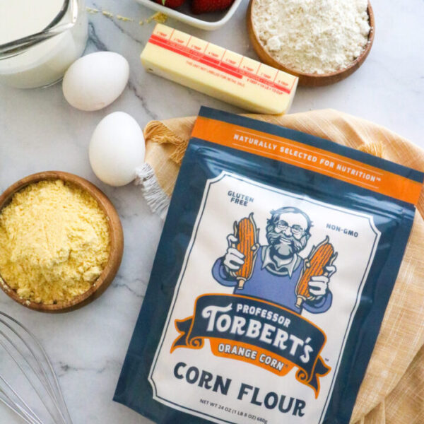 Toberber's Orange Corn Flour 24 oz ingredients on a marble countertop.